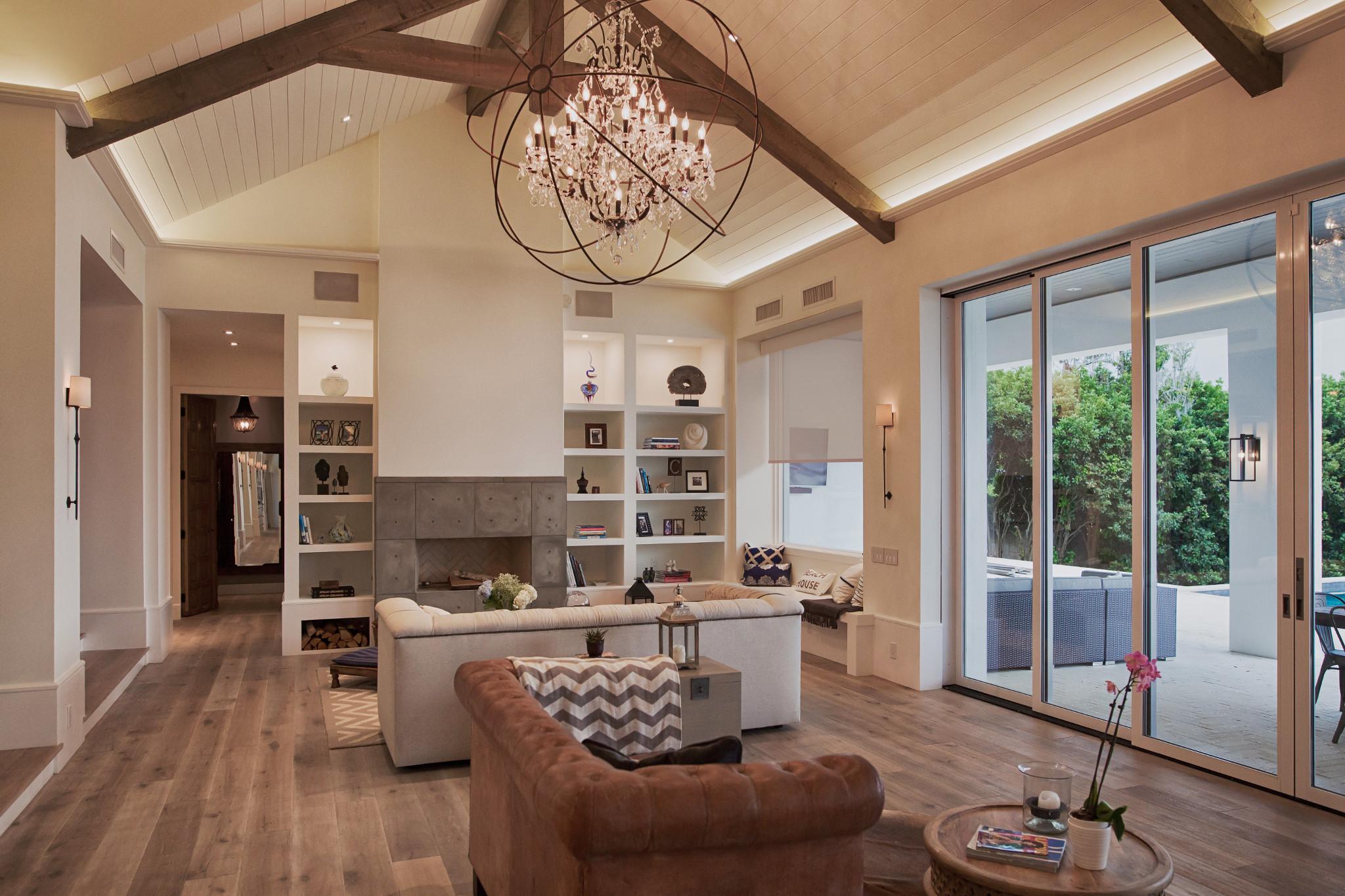 Lutron automated shades allow ambient light into a living room